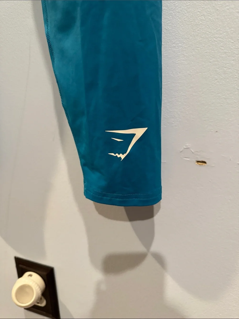 Gymshark Element Baselayer Leggings in a blue colorway.